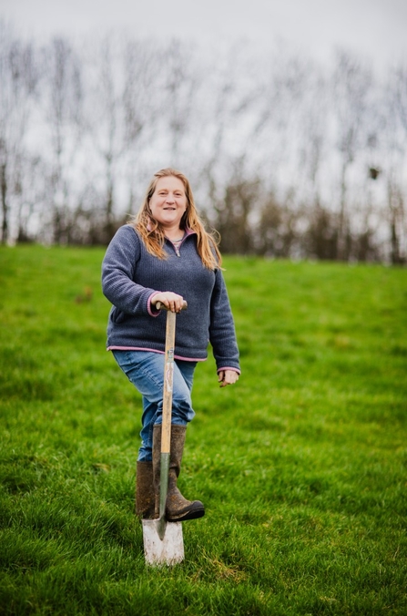 Debbie Wilkins standing in a field